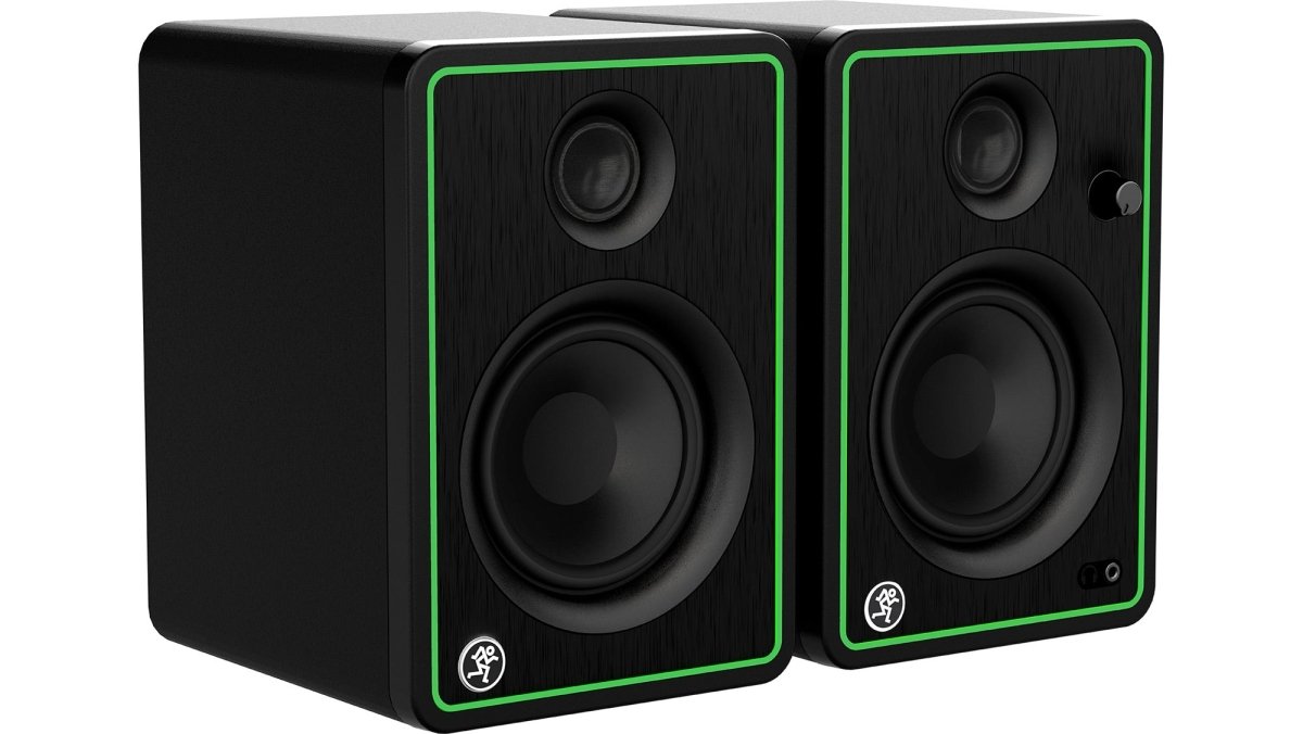 The Mackie CR4-XBT monitors, showcasing their signature black finish with vibrant green trim around the speakers.