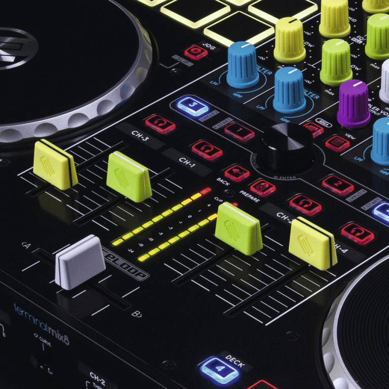 Close-up of the Reloop fader cap replacement set in a bold yellow color, showing their ergonomic shape.