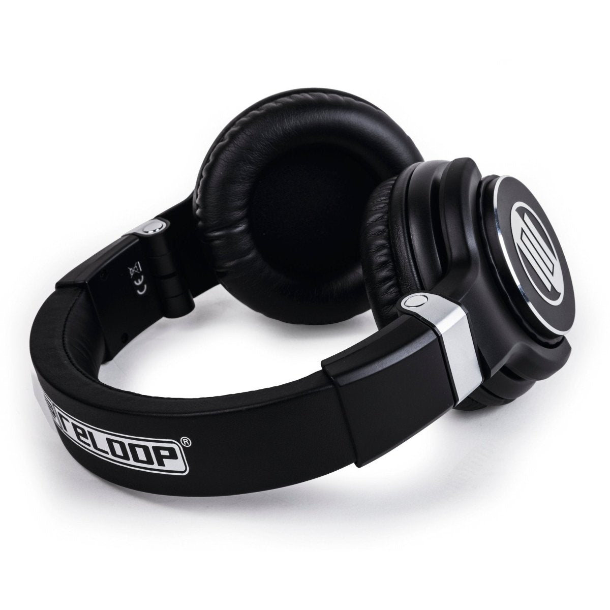 A pair of black Reloop RHP-15 headphones, featuring a sturdy construction and rotating earcups for single-ear mixing.